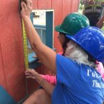 Jane helps girl measure trim 2